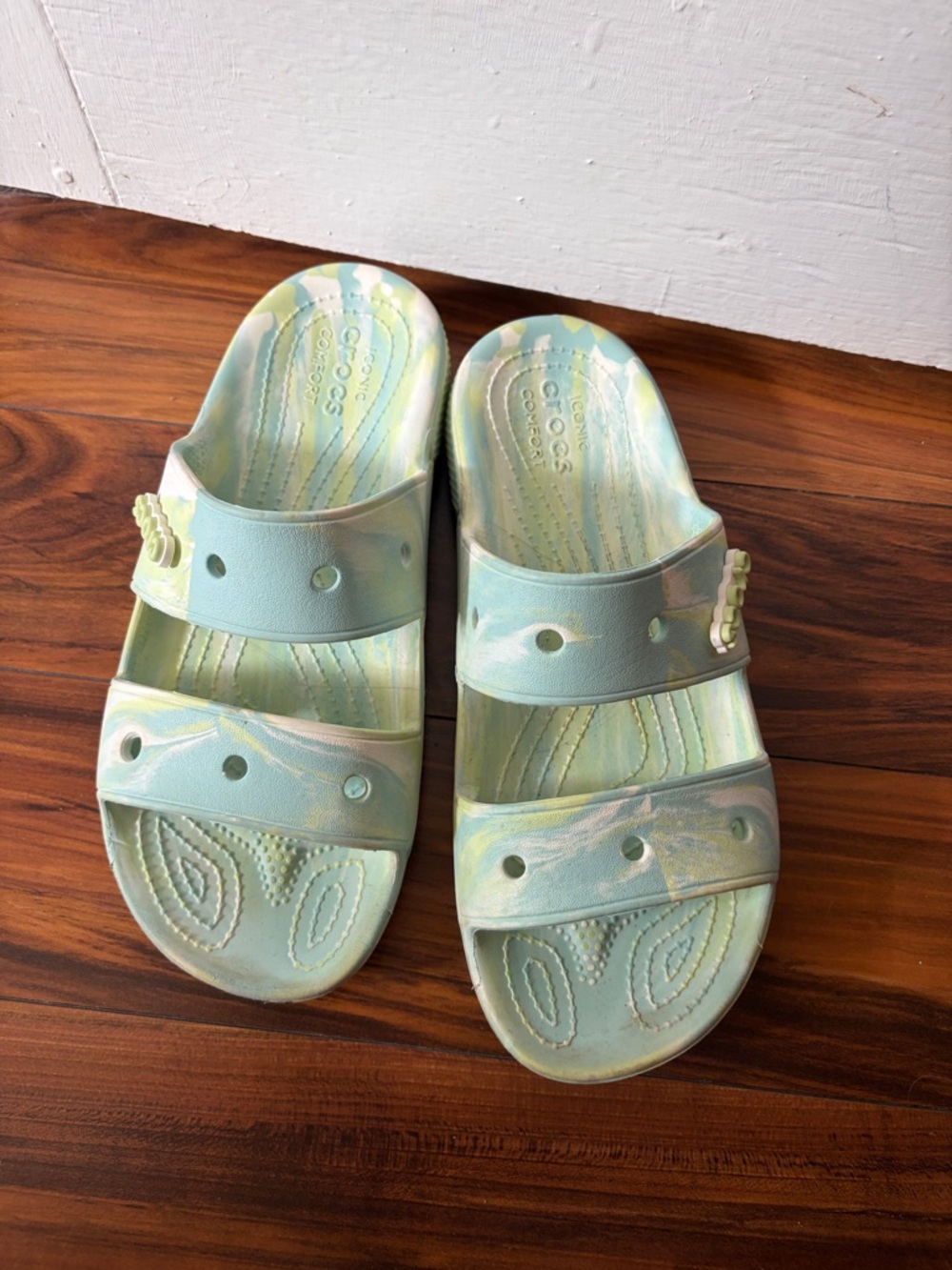 CROCS pastel mint and pale yellow marbled slide sandals